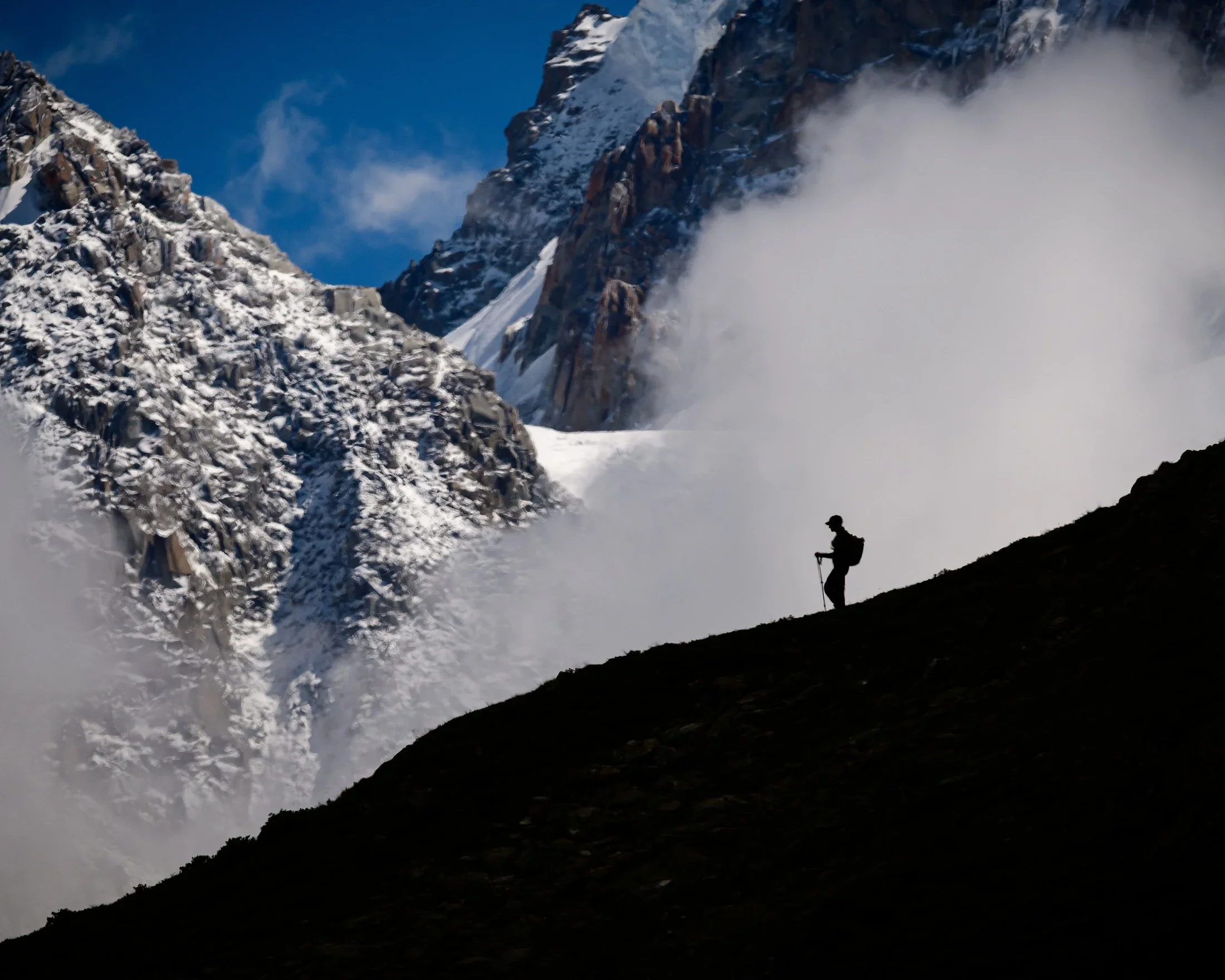 A lone runner on the Brévent trail above the Chamonix valley