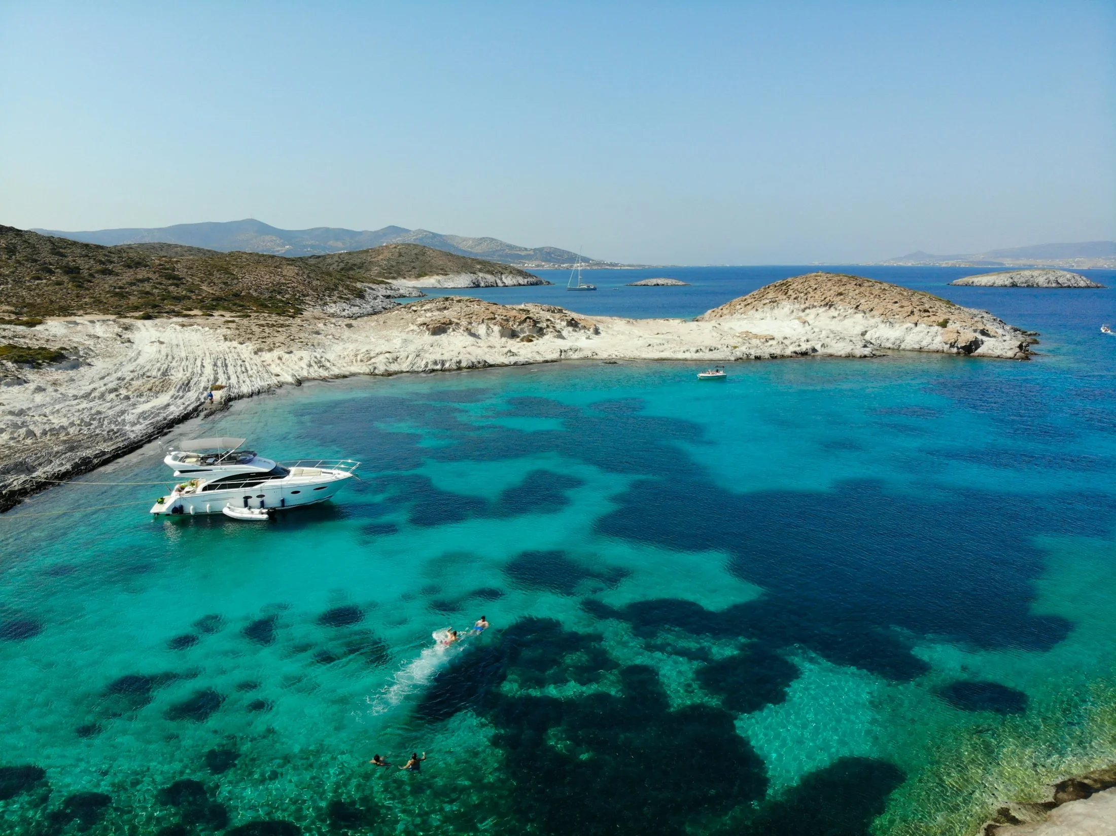 Turquoise bay of Antiparos with yachts
